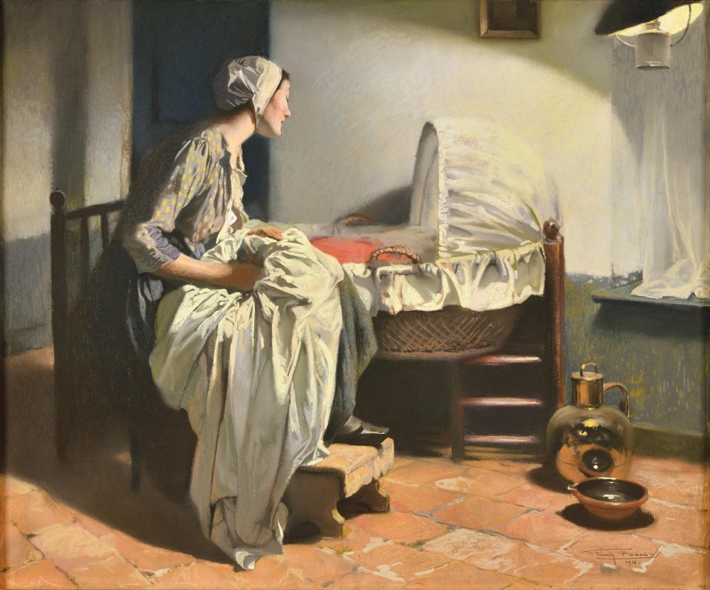 Young mother watching over the cradle