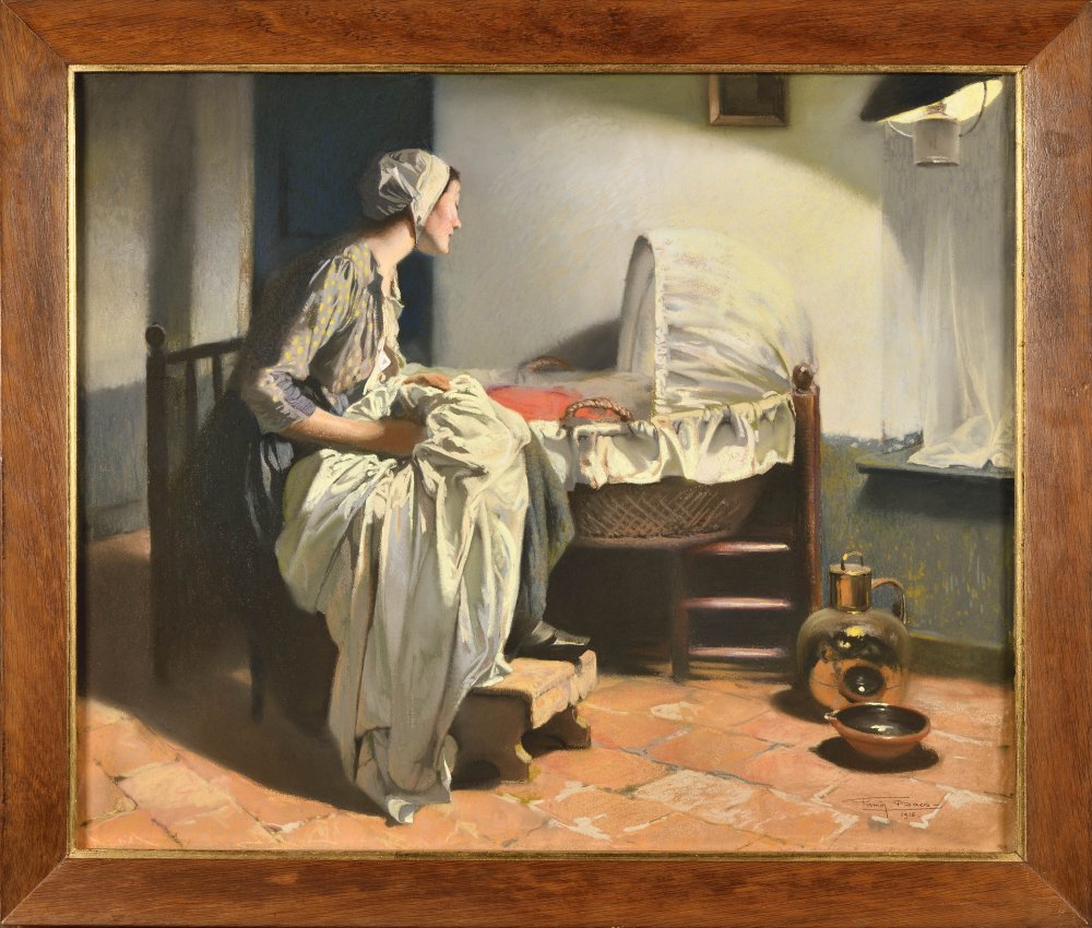 Young mother watching over the cradle